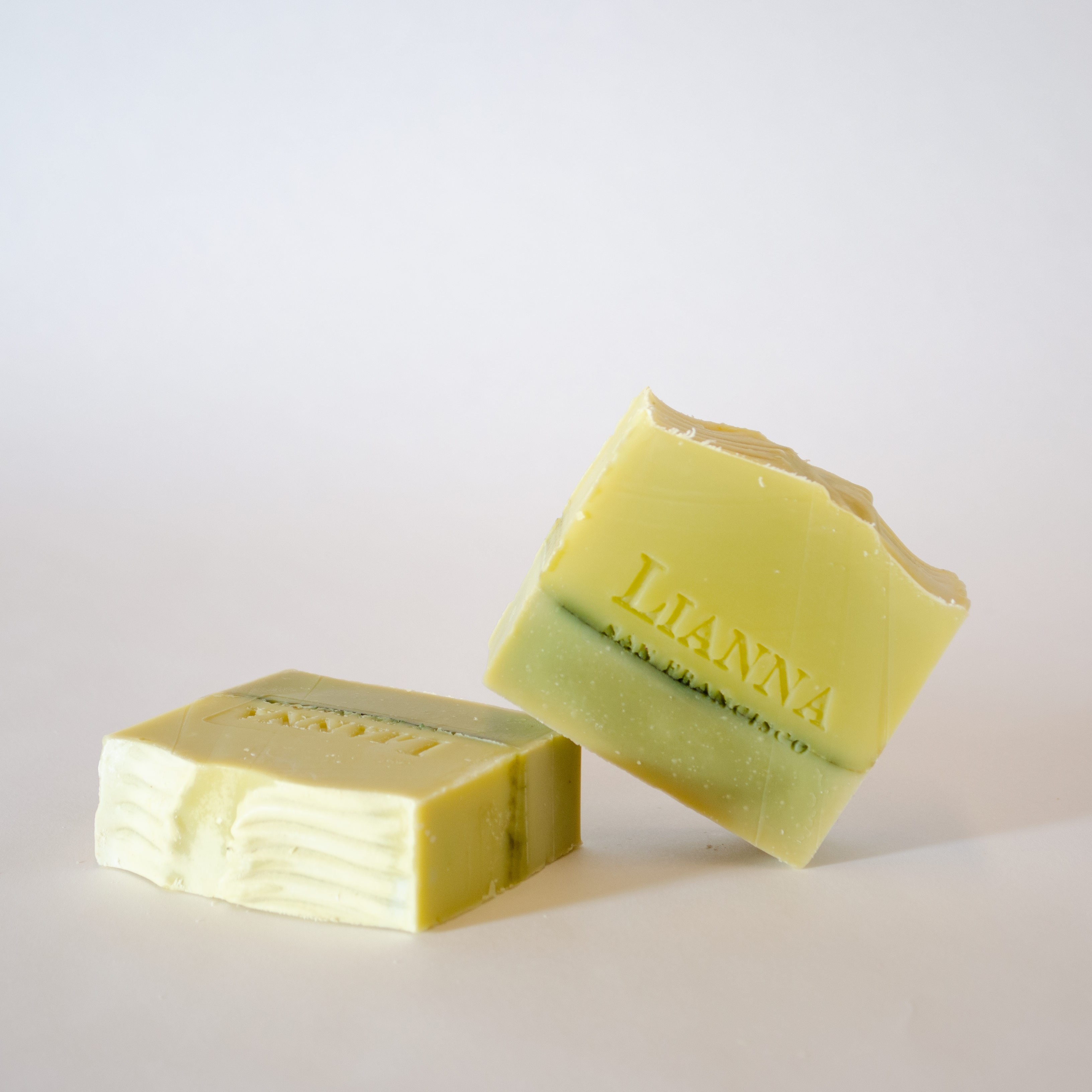 Olive oil soap bars that are half green and half white. Scented with spearmint and Lime. Made in San Francisco, California. 