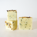 California olive oil soap scented with spearmint sage essential oil and speckled with garden grown herbs. 