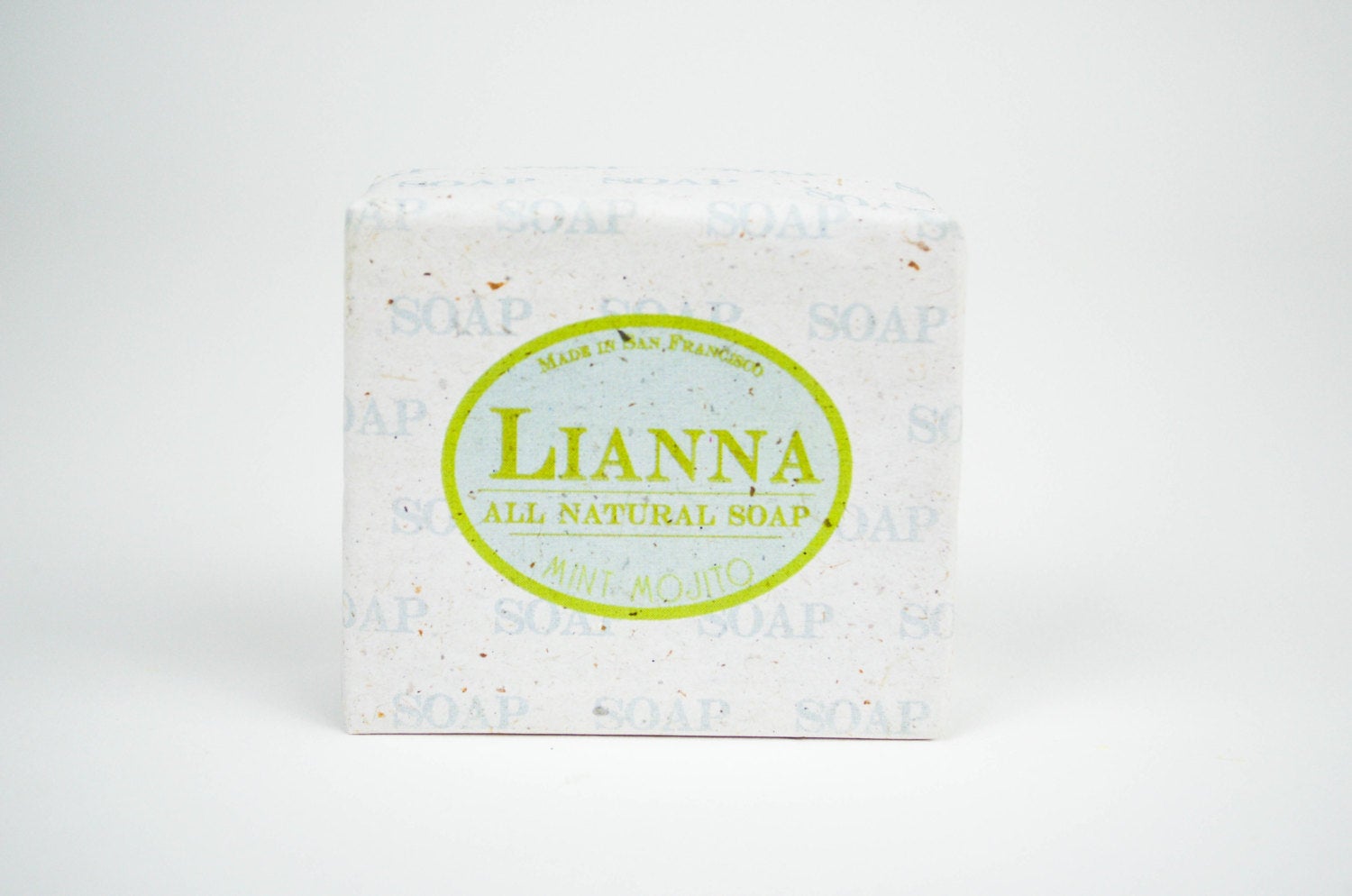 Mint mojito olive oil soap bar wrapped in tree free biodegradable paper. 