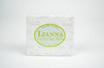 Load image into Gallery viewer, Mint mojito olive oil soap bar wrapped in tree free biodegradable paper. 
